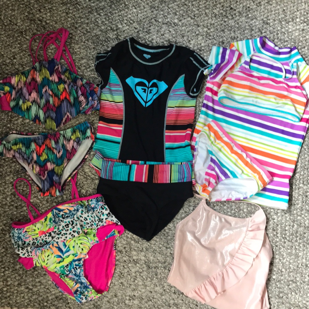 Five gently used swimsuits